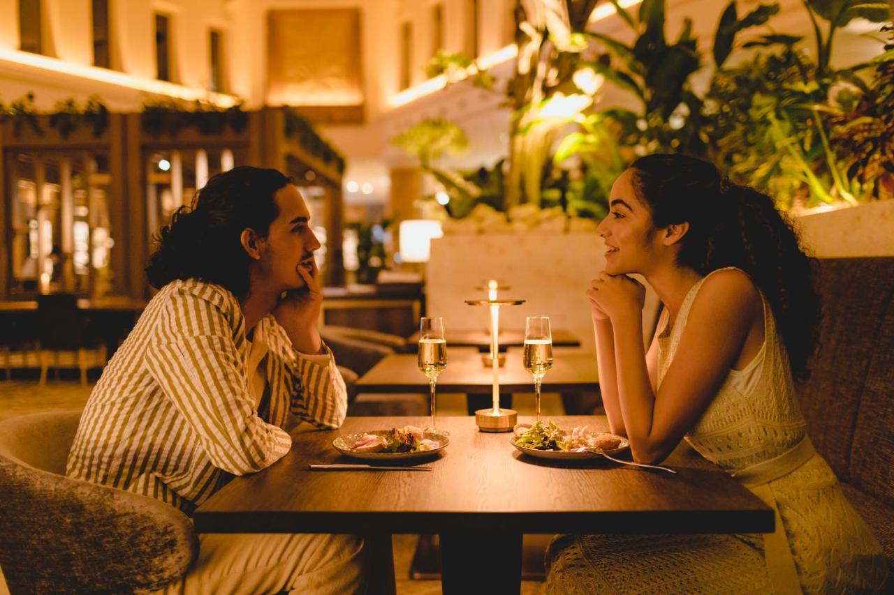 Oriental Hotel Okinawa Resort & Spa Nago Exterior photo A couple on a date