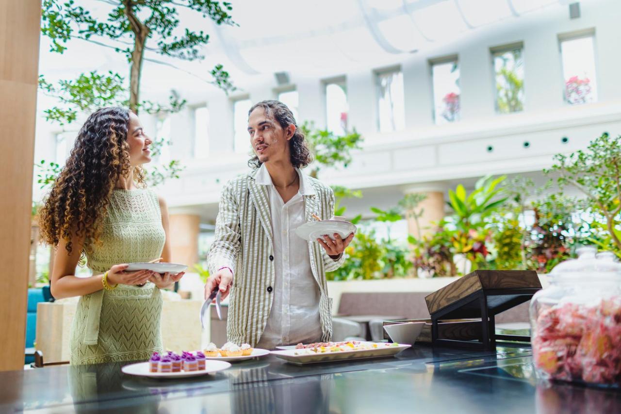 Oriental Hotel Okinawa Resort & Spa Nago Exterior photo The Atrium