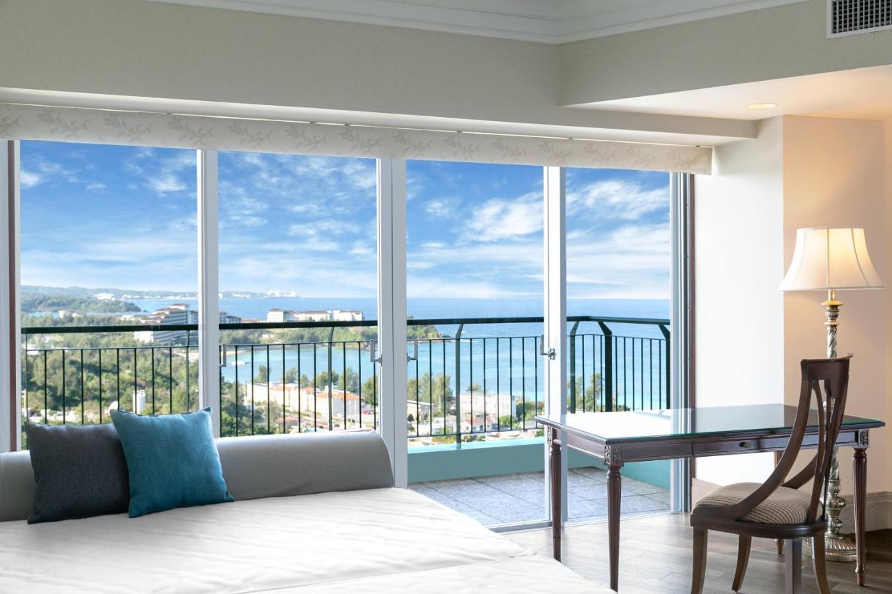 Oriental Hotel Okinawa Resort & Spa Nago Exterior photo A staged photo of a bedroom