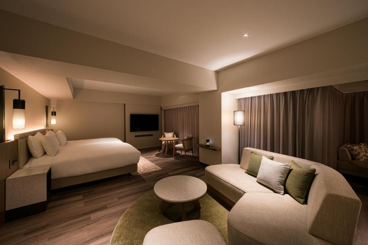 Oriental Hotel Okinawa Resort & Spa Nago Exterior photo A suite at the hotel