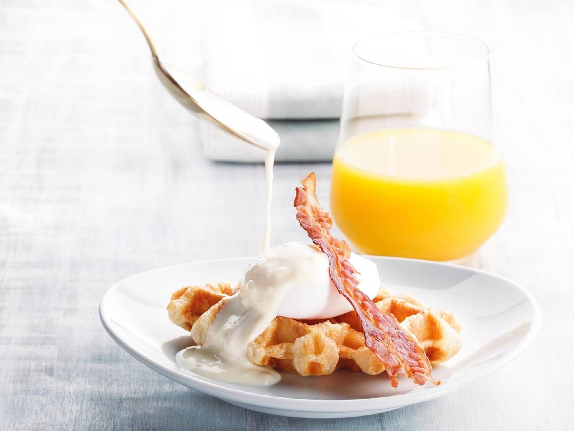 Oriental Hotel Okinawa Resort & Spa Nago Exterior photo A breakfast of waffles, bacon and orange juice