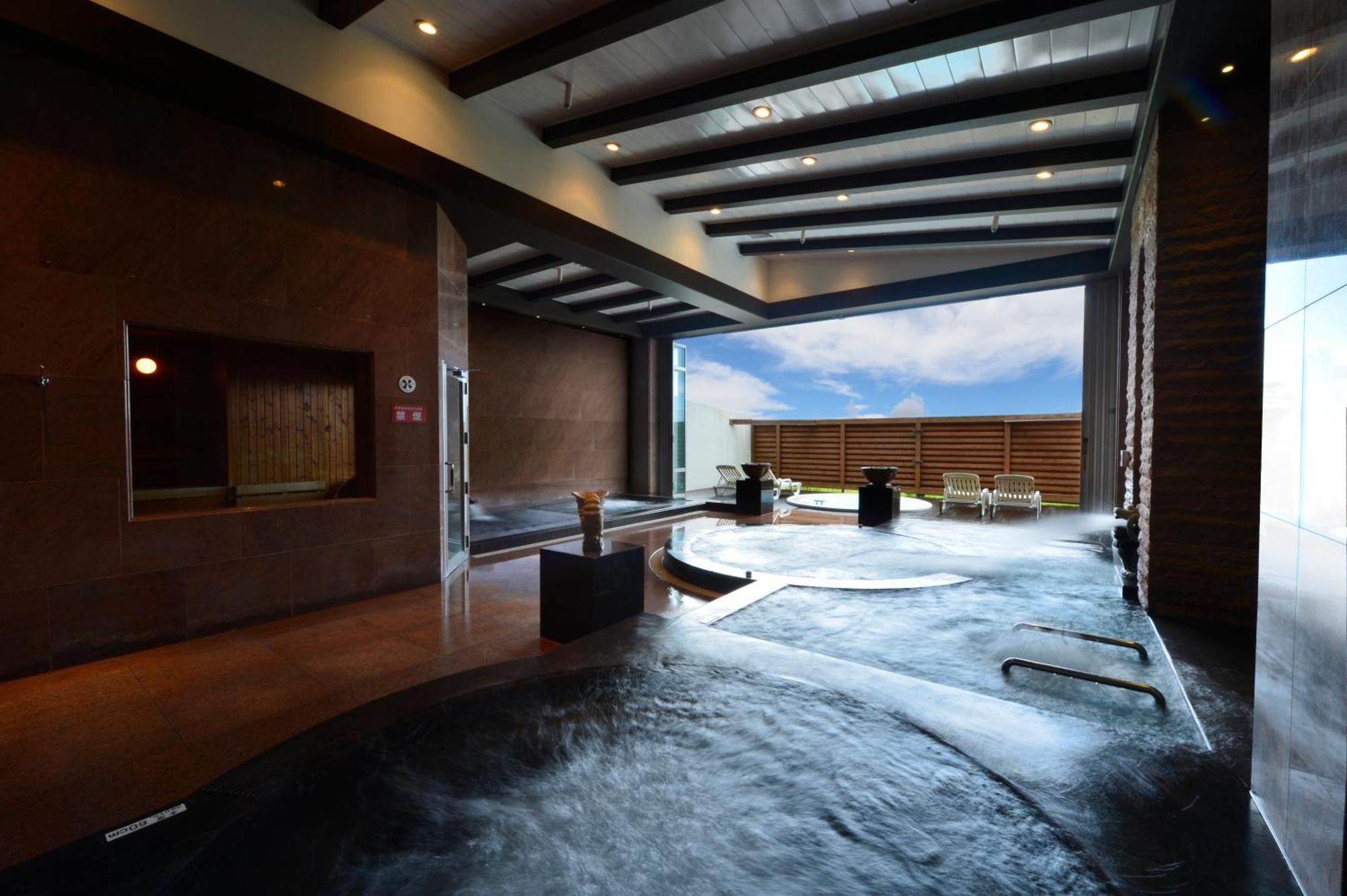 Oriental Hotel Okinawa Resort & Spa Nago Exterior photo A modern onsen in Tokyo
